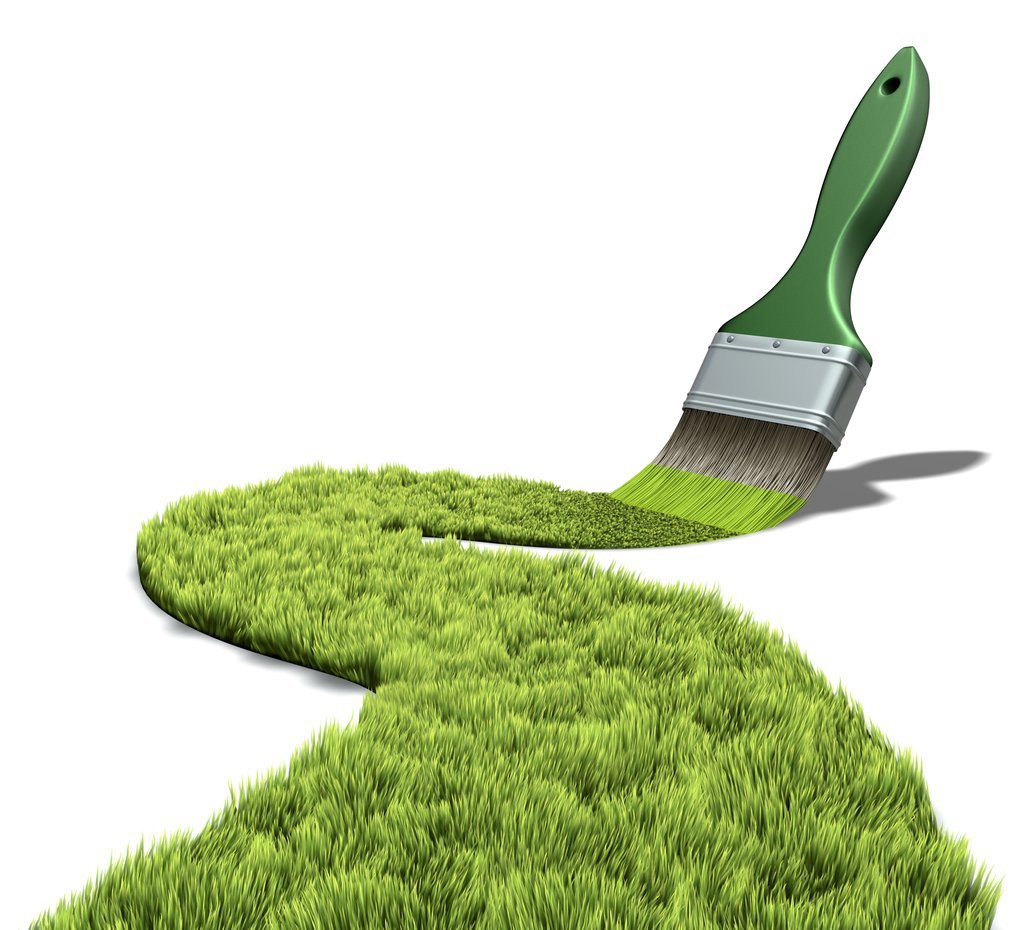 Resimde, yeşil renkli bir boya fırçasının çimen dokusu oluşturduğu görülmektedir. Bu görsel, doğa temalı projeler veya çevre düzenlemesi konseptleri i